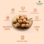 Close-up of Balwan Laddu showing dense texture, nuts, and ghee coating