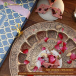 Fresh Rose Katli in assorted floral-themed mithai box with rose laddu and pista paan