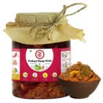 Traditional jar of avakaya pickle with Telugu script details