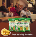 Khatta Meetha showcasing vibrant mix of yellow sev orange boondi in traditional serving bowl display